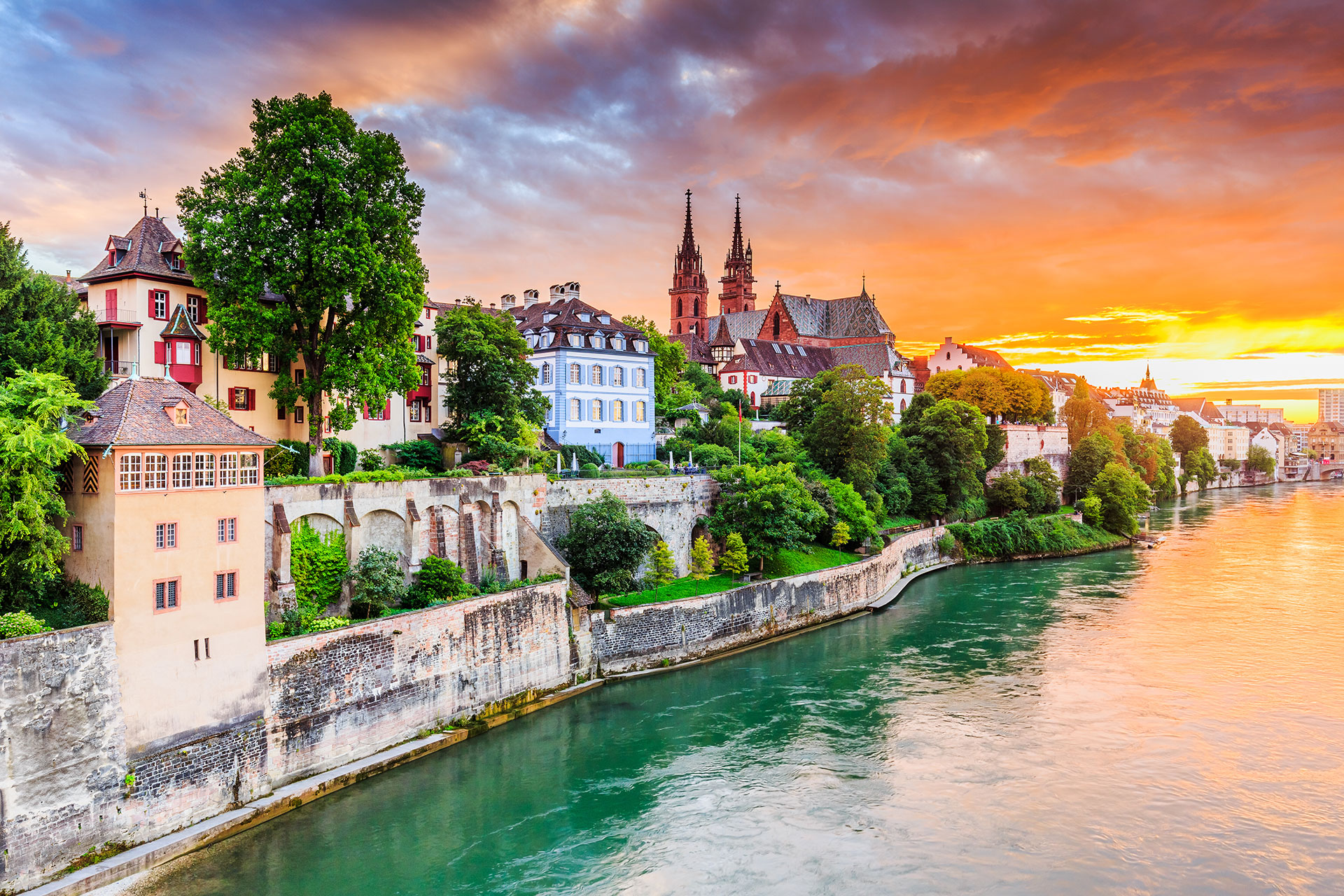 https://cdn.tern.travel/rails/active_storage/blobs/proxy/eyJfcmFpbHMiOnsibWVzc2FnZSI6IkJBaHBBL3NKZXc9PSIsImV4cCI6bnVsbCwicHVyIjoiYmxvYl9pZCJ9fQ==--7acfe4c518fec3bbcab393143d39acb0127cd31a/Beautiful-sunset-in-Basel-Switzerland.jpg